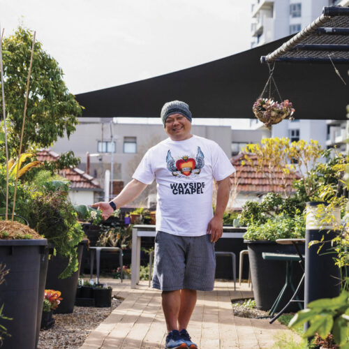 Gardening above the fray Jensen enjoys his time in the Wayside Chapel rooftop garden.